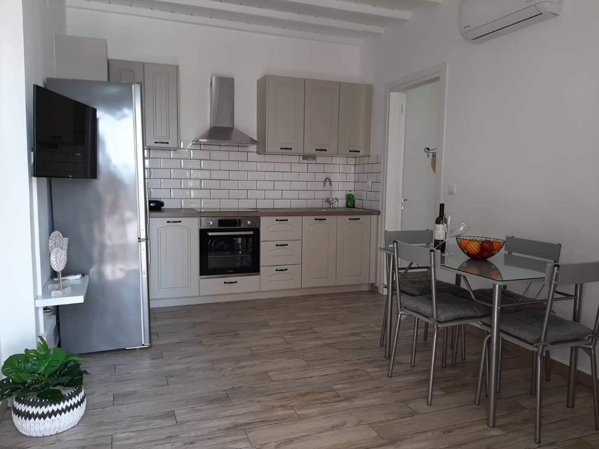 Alisachni Apartment Kini Bagian luar foto